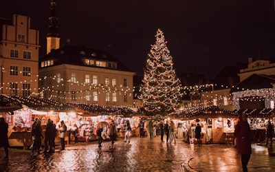 Holiday festival in city square at night
