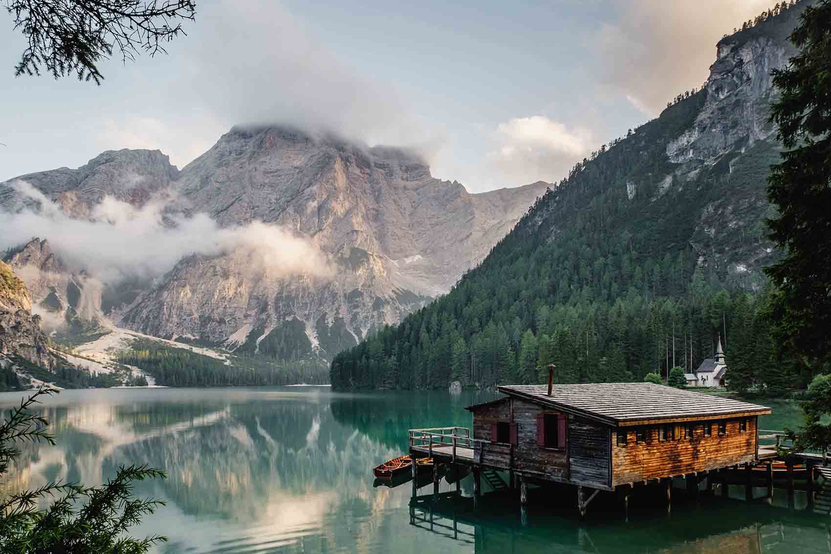 Fishing cabin on lake in the mountains
