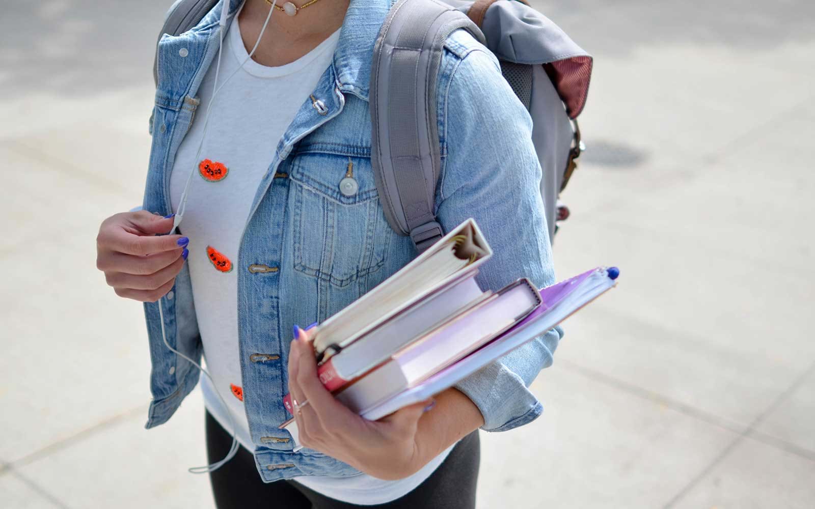 Student carrying books